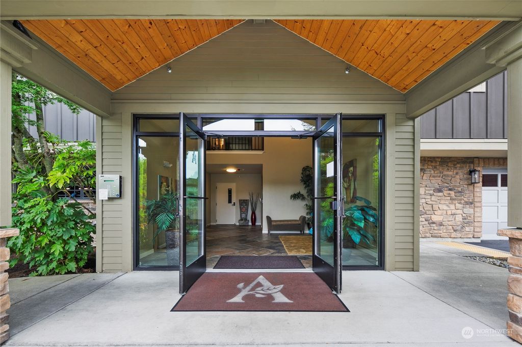 Photo of 6800 132nd Place NE #E202, Newcastle, WA 98059 (MLS # 2287079)