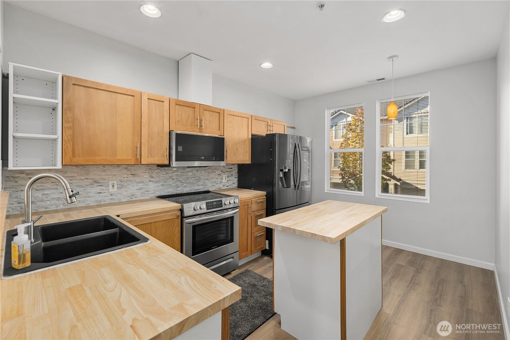 Photo of 6231 S 233rd Street #25-2, Kent, WA 98032 (MLS # 2580466)