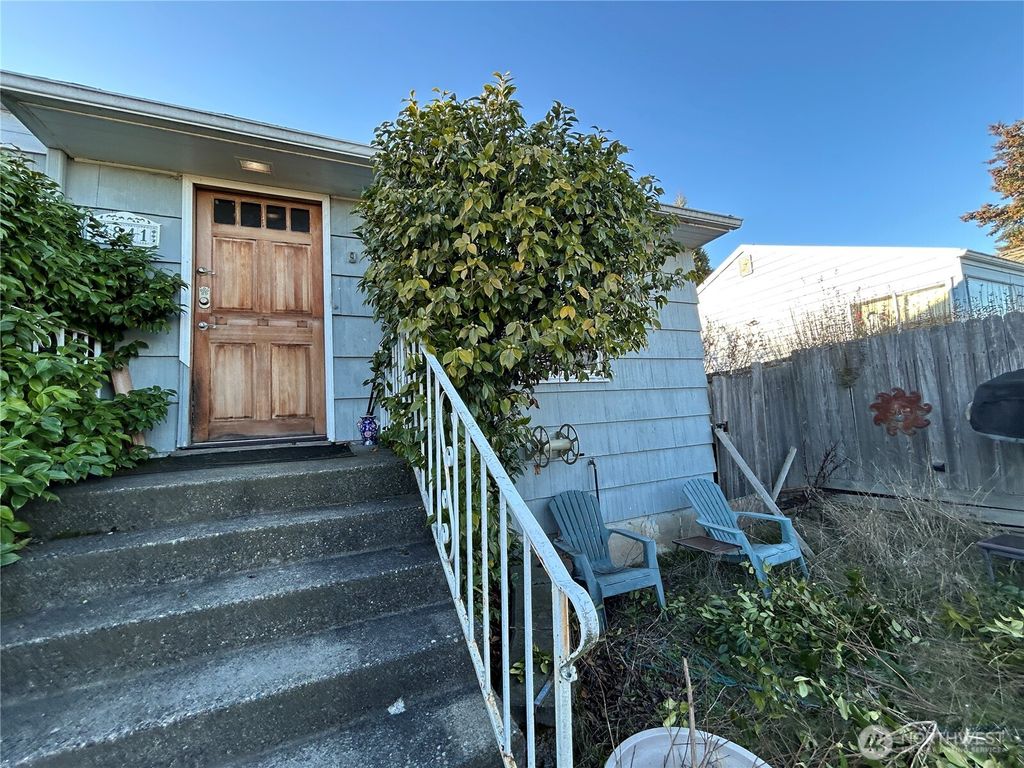 Photo of 3841 37th Avenue SW, Seattle, WA 98126 (MLS # 2346162)