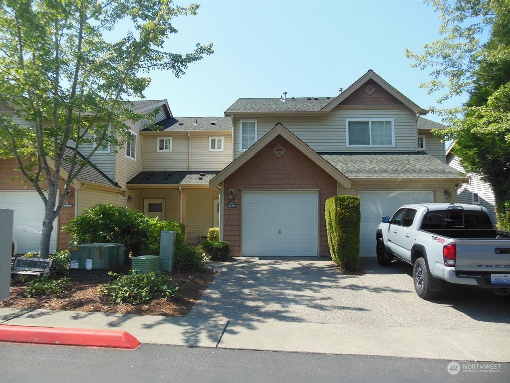 Photo of 4761 Whitworth Place S #K103, Renton, WA 98055 (MLS # 2277691)