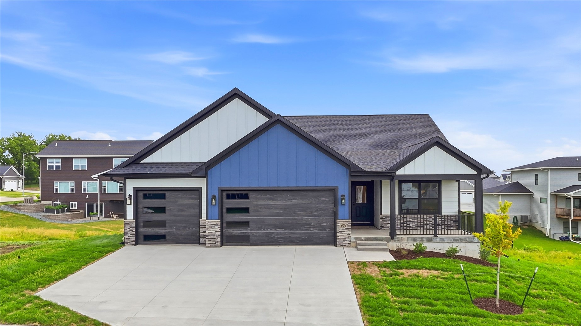 Photo 1 of 49 — 604 Rock Ridge Rd, Tiffin, IA 52340