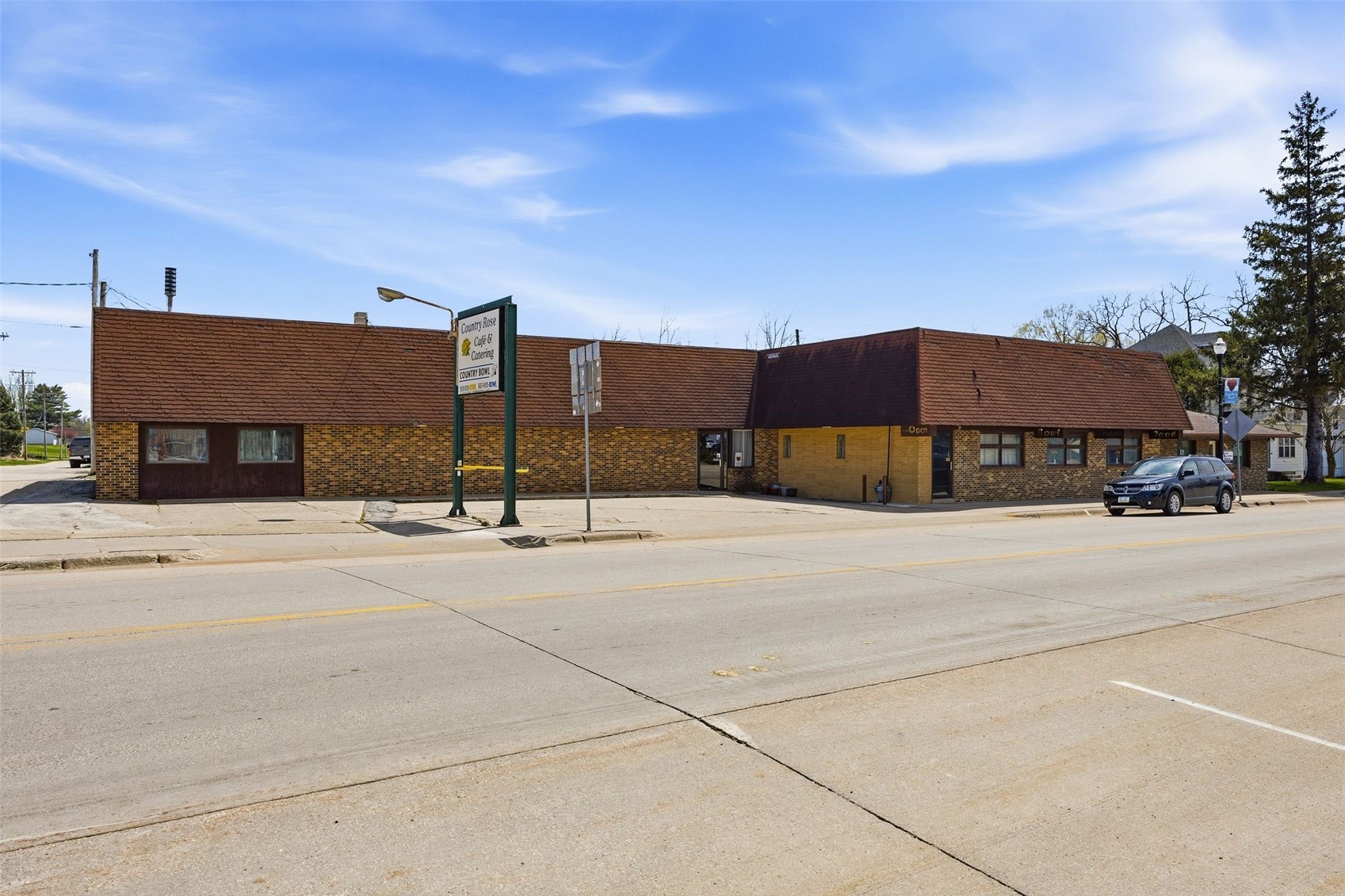 Photo 1 of 43 — 112 Commercial Street, Strawberry Pt, IA 52076