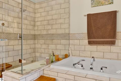 Tiny photo for 11720 Easy Street, Kewadin, MI 49648 (MLS # 1941207)