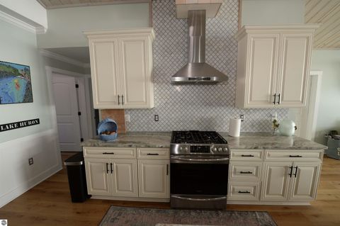 Tiny photo for 629 W Lake Street, Tawas City, MI 48763 (MLS # 1939842)