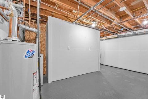 Tiny photo for 10759 S Timberlee Drive #4, Traverse City, MI 49684 (MLS # 1940128)