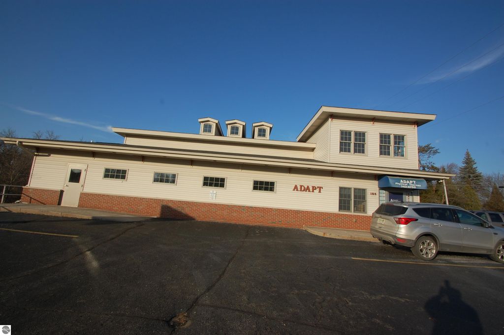 Photo of 105 W Houghton Avenue, West Branch, MI 48661 (MLS # 1933441)