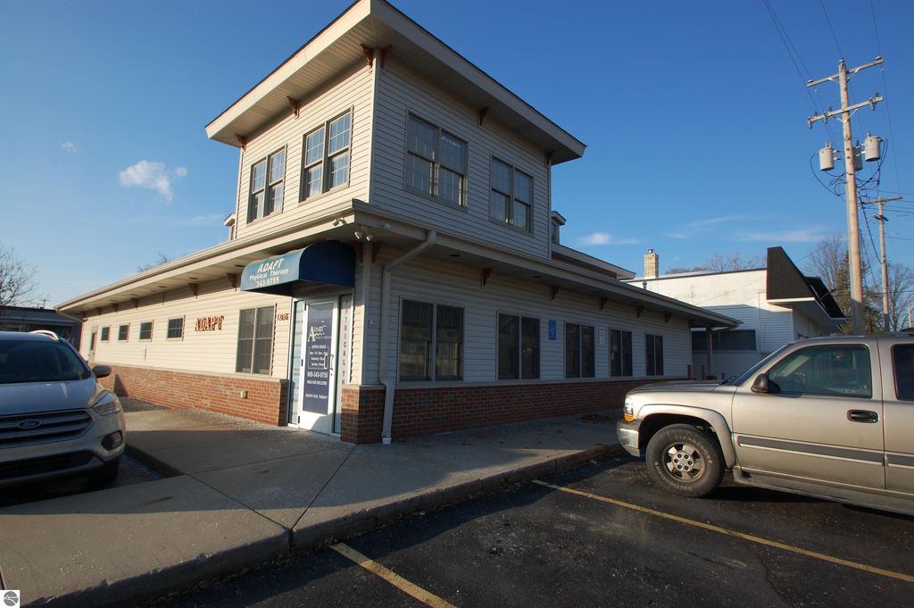 Photo of 105 W Houghton Avenue, West Branch, MI 48661 (MLS # 1933441)