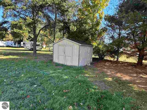 Tiny photo for 1944 West Street, Central Lake, MI 49622 (MLS # 1939947)
