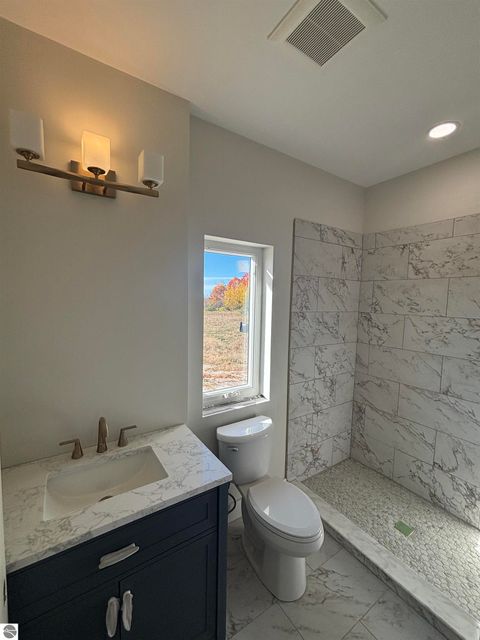 Tiny photo for 136 Mooney Way, Kewadin, MI 49648 (MLS # 1940043)