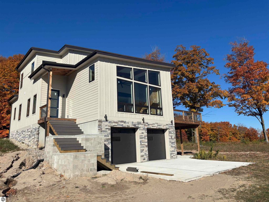 Photo of 136 Mooney Way, Kewadin, MI 49648 (MLS # 1940043)