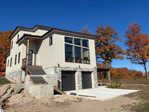 Tiny photo for 136 Mooney Way, Kewadin, MI 49648 (MLS # 1940043)