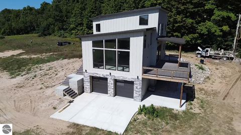 Tiny photo for 136 Mooney Way, Kewadin, MI 49648 (MLS # 1940043)