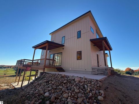 Tiny photo for 136 Mooney Way, Kewadin, MI 49648 (MLS # 1940043)