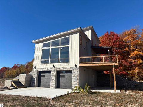 Tiny photo for 136 Mooney Way, Kewadin, MI 49648 (MLS # 1940043)