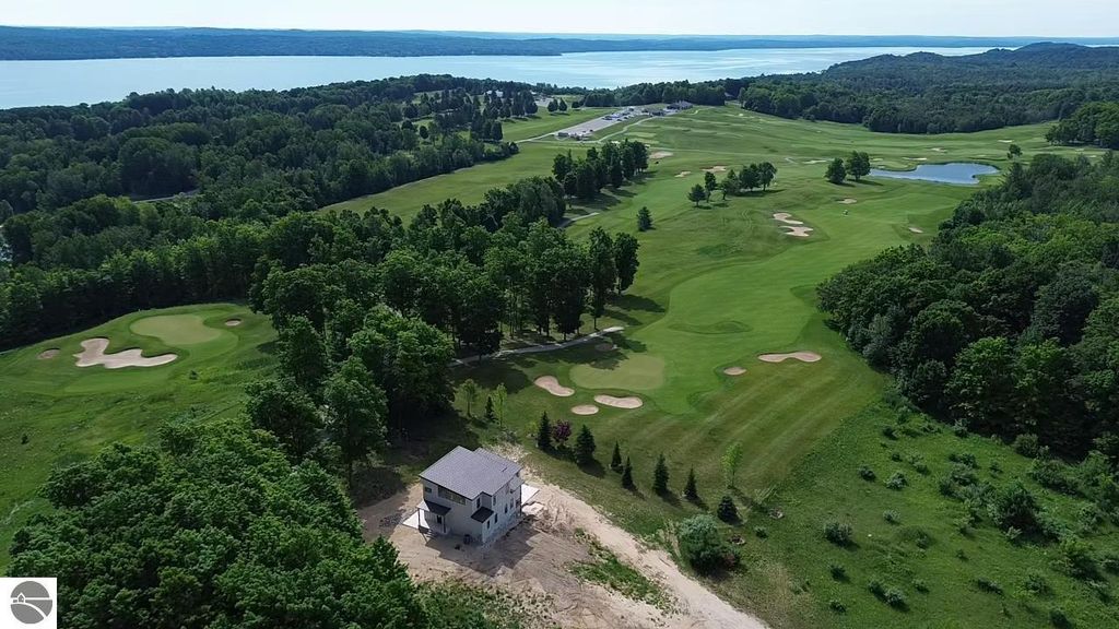 Photo of 136 Mooney Way, Kewadin, MI 49648 (MLS # 1940043)