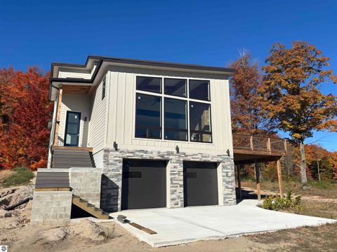 Tiny photo for 136 Mooney Way, Kewadin, MI 49648 (MLS # 1940043)