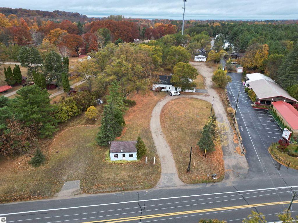Photo of 12877 US-31 N, Charlevoix, MI 49720 (MLS # 1928493)