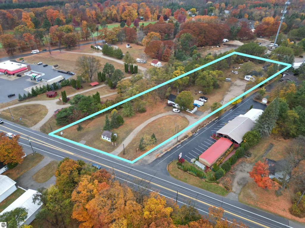 Photo of 12877 US-31 N, Charlevoix, MI 49720 (MLS # 1928493)