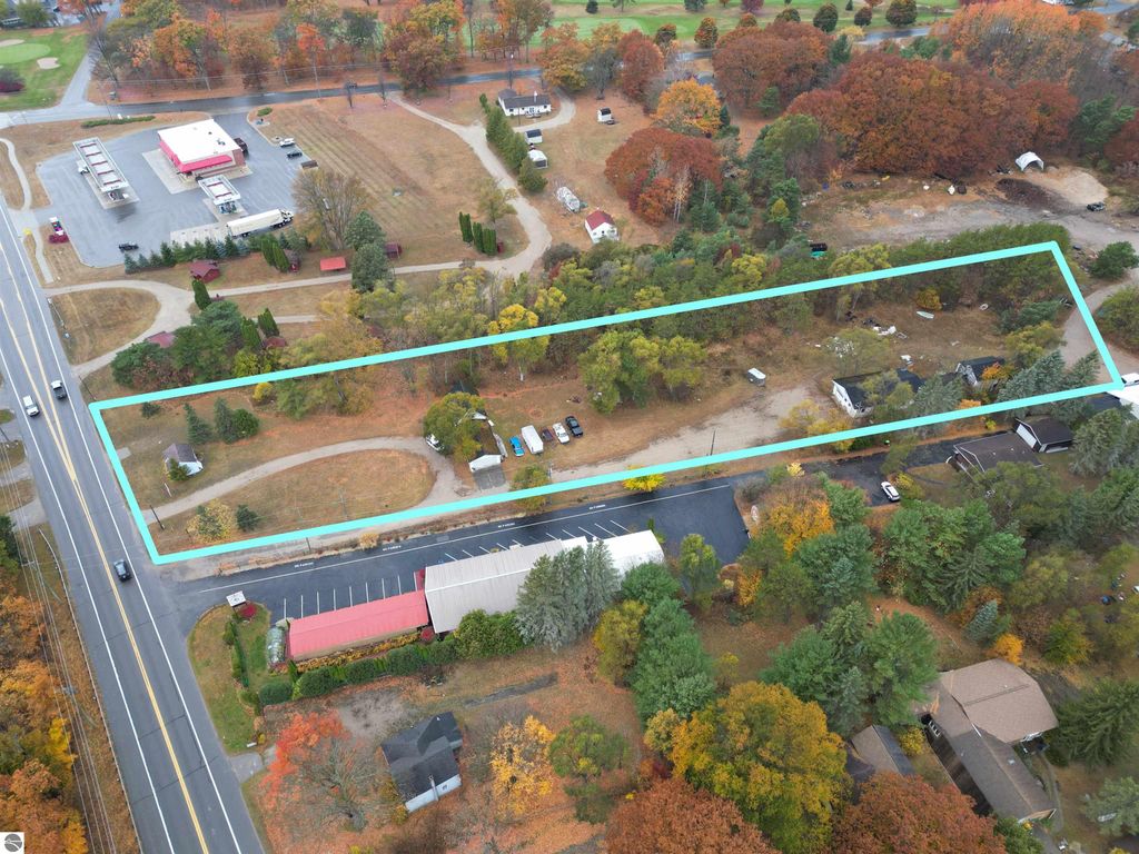 Photo of 12877 US-31 N, Charlevoix, MI 49720 (MLS # 1928493)