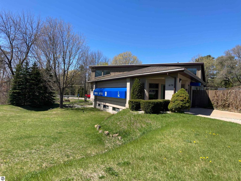 Photo of 6170 US-31 N, Williamsburg, MI 49690 (MLS # 1933740)