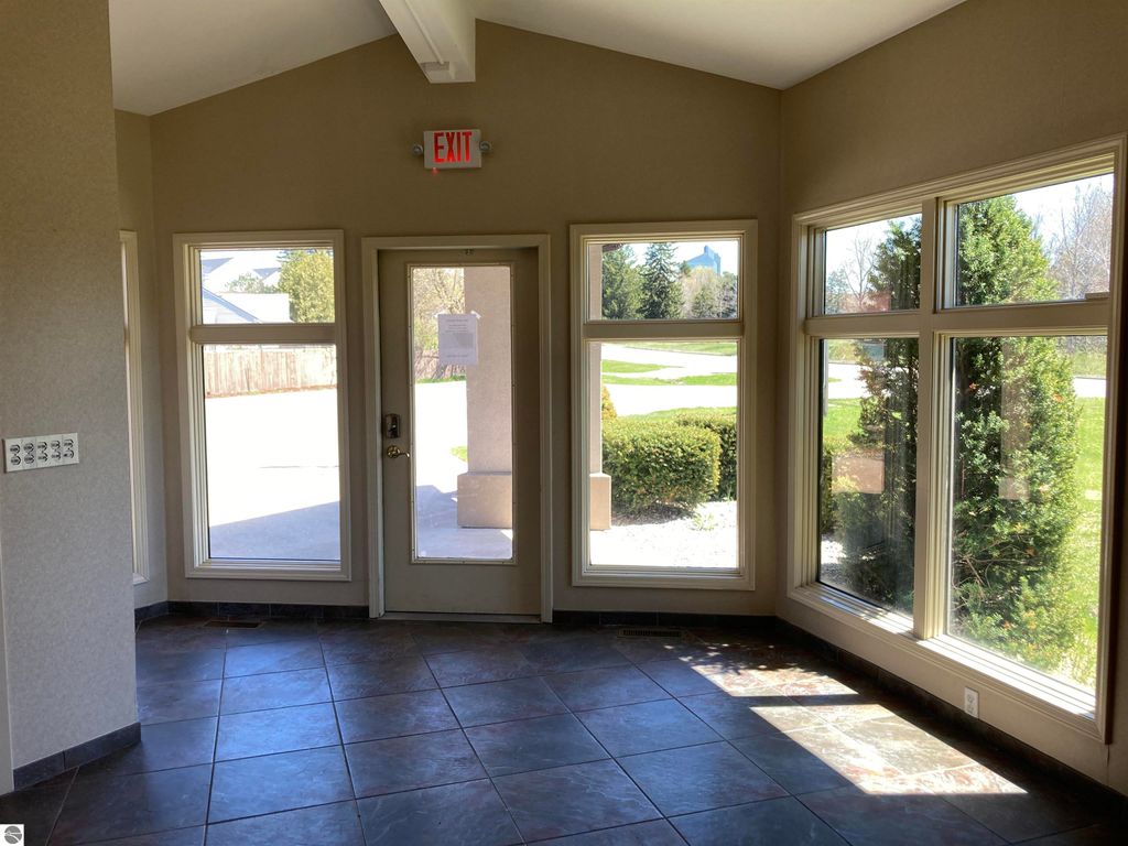 Photo of 6170 US-31 N, Williamsburg, MI 49690 (MLS # 1933740)