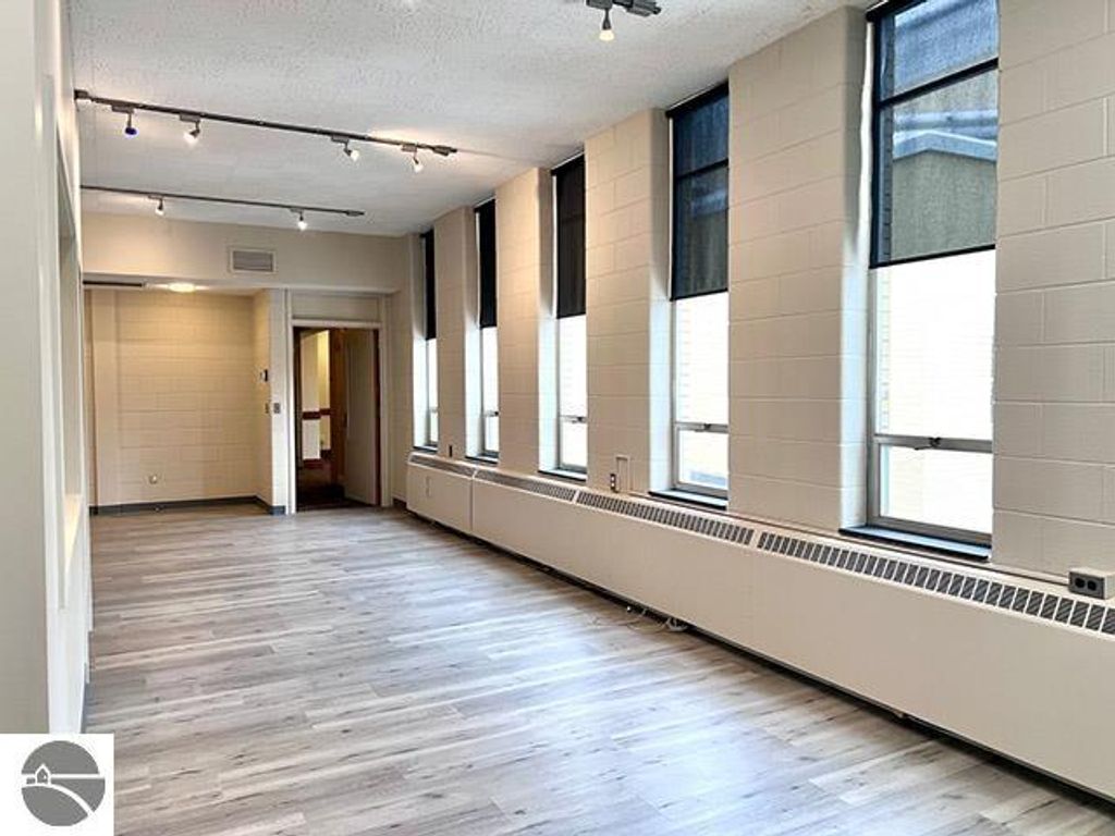 Photo of 1200 W Eleventh #207, Traverse City, MI 49684 (MLS # 1934118)