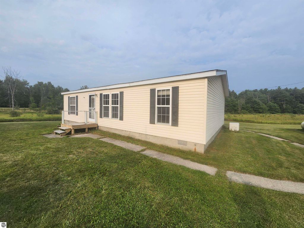 Photo of 1027 S Lorenz Road, Tawas City, MI 48763 (MLS # 1937287)