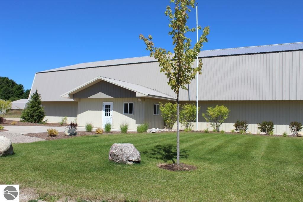 Photo of 6945 Windjammer Avenue #E-3, Kewadin, MI 49648 (MLS # 1936230)