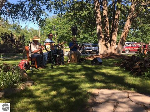 Tiny photo for 149 E Harbor Highway, Maple City, MI 49664 (MLS # 1939924)