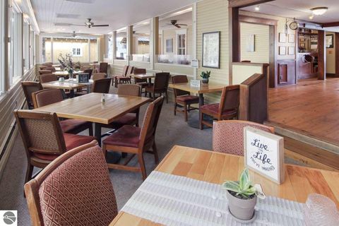 Tiny photo for 149 E Harbor Highway, Maple City, MI 49664 (MLS # 1939924)