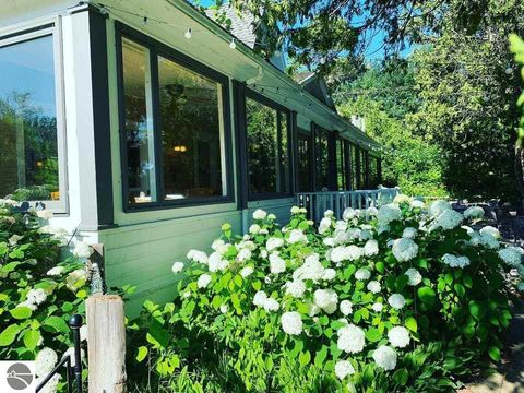 Tiny photo for 149 E Harbor Highway, Maple City, MI 49664 (MLS # 1939924)