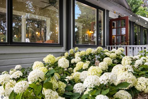 Tiny photo for 149 E Harbor Highway, Maple City, MI 49664 (MLS # 1939924)