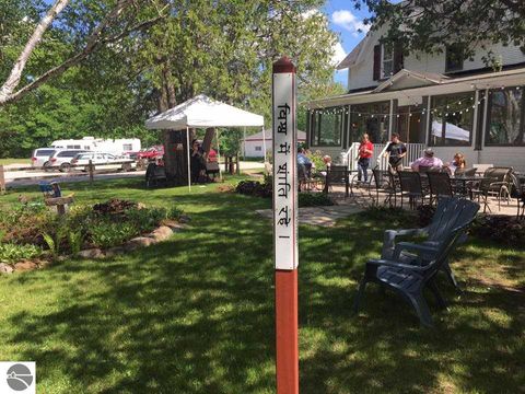 Tiny photo for 149 E Harbor Highway, Maple City, MI 49664 (MLS # 1939924)