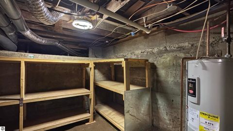 Tiny photo for 825 Walnut Street, Cadillac, MI 49601 (MLS # 1940388)