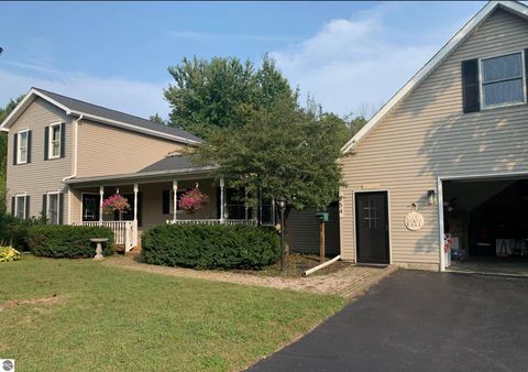 Photo of 254 US-31 N, Kewadin, MI 49648 (MLS # 1940384)