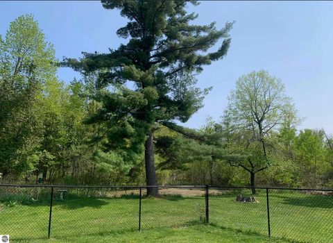 Tiny photo for 254 US-31 N, Kewadin, MI 49648 (MLS # 1940384)