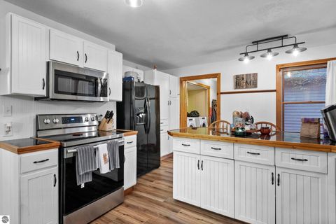 Tiny photo for 254 US-31 N, Kewadin, MI 49648 (MLS # 1940384)