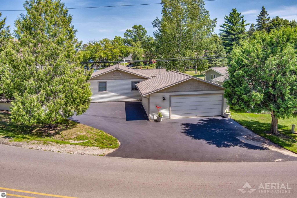 Photo of 1580 N Ogemaw Trail, West Branch, MI 48661 (MLS # 1936511)