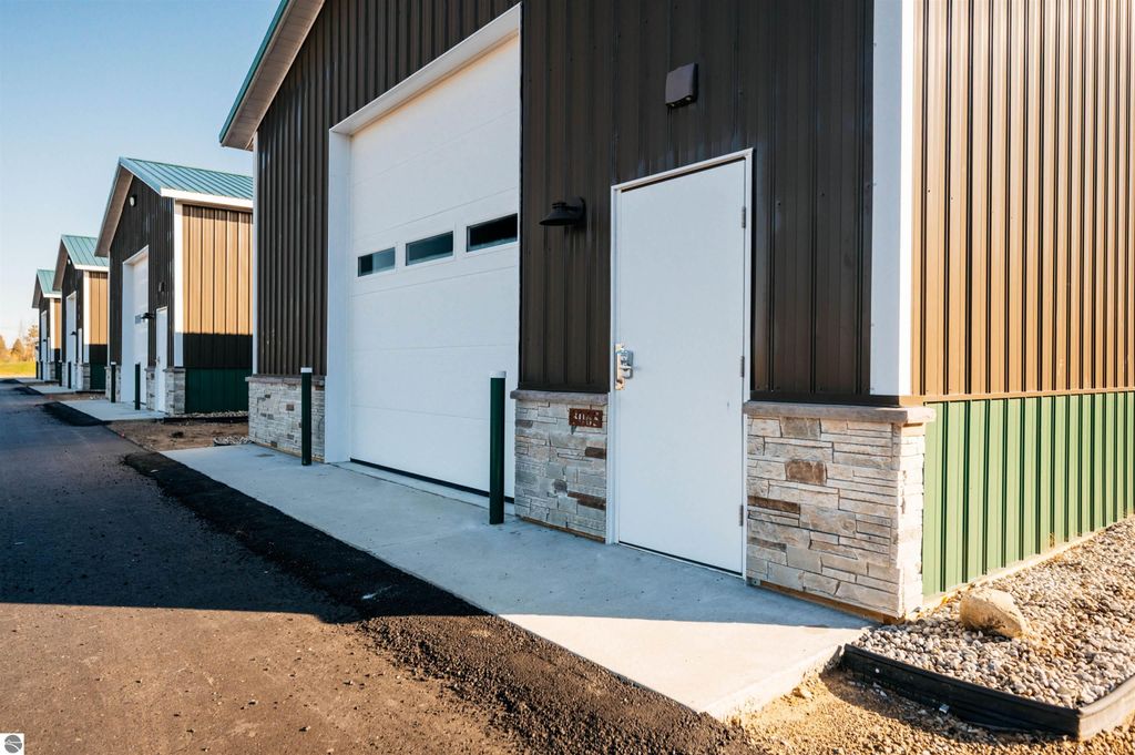 Photo of 3052 Luxury Barn Lane #26, Traverse City, MI 49685 (MLS # 1937796)