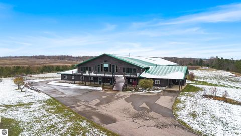 Photo of 130 S Peninsula, East Jordan, MI 49727 (MLS # 1940605)