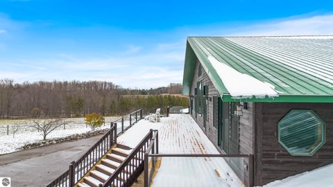 Tiny photo for 130 S Peninsula, East Jordan, MI 49727 (MLS # 1940605)