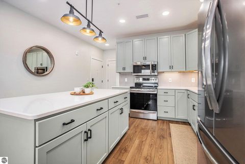 Tiny photo for 714 Randolph Street #205, Traverse City, MI 49684 (MLS # 1939960)