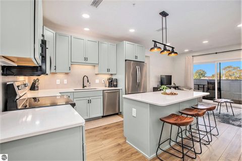 Tiny photo for 714 Randolph Street #205, Traverse City, MI 49684 (MLS # 1939960)