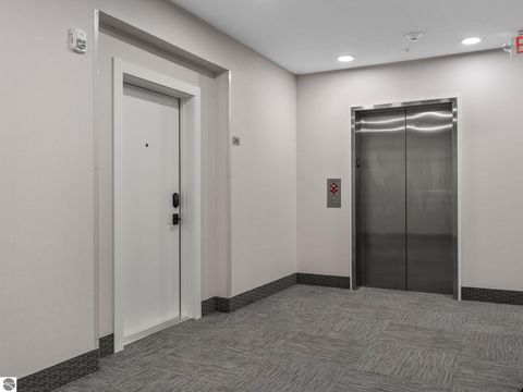 Tiny photo for 714 Randolph Street #205, Traverse City, MI 49684 (MLS # 1939960)