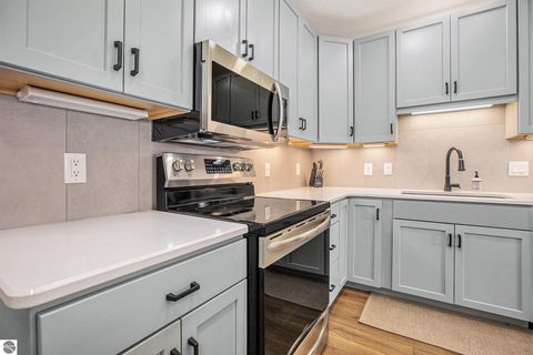 Tiny photo for 714 Randolph Street #205, Traverse City, MI 49684 (MLS # 1939960)