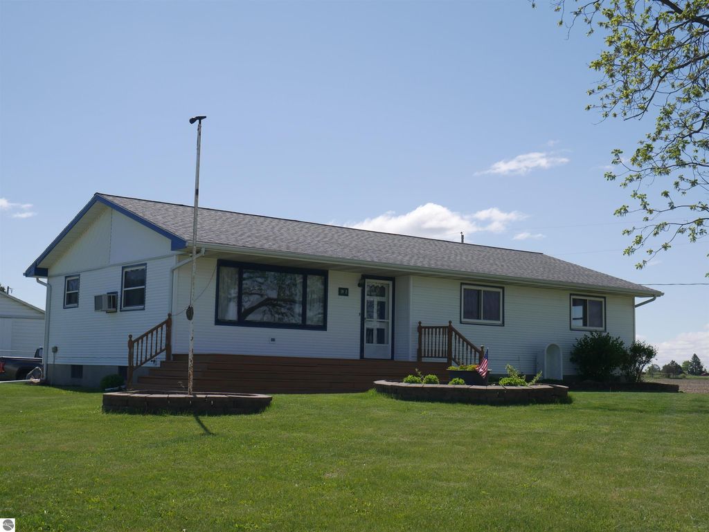 Photo of 1992 N 7 Mile Road, Pinconning, MI 48650 (MLS # 1937926)