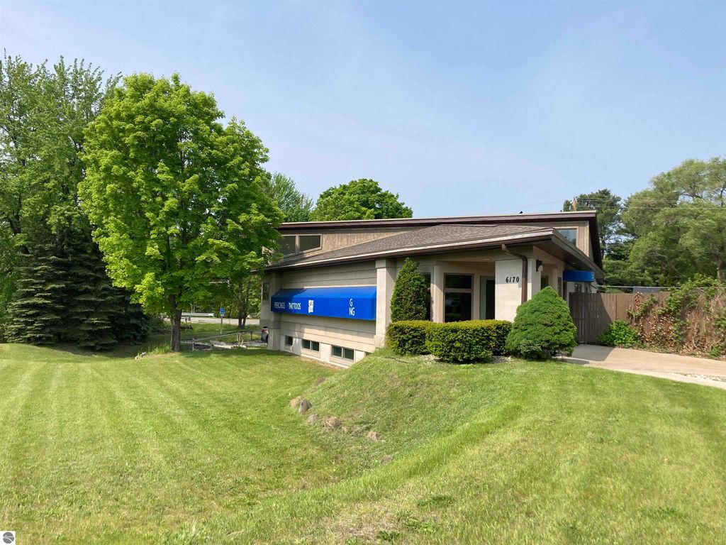 Photo of 6170 US-31 N, Williamsburg, MI 49690 (MLS # 1935191)
