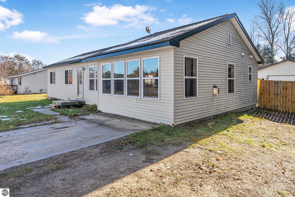 Photo of 7423 Scotchwood Lane, Grawn, MI 49637 (MLS # 1940549)