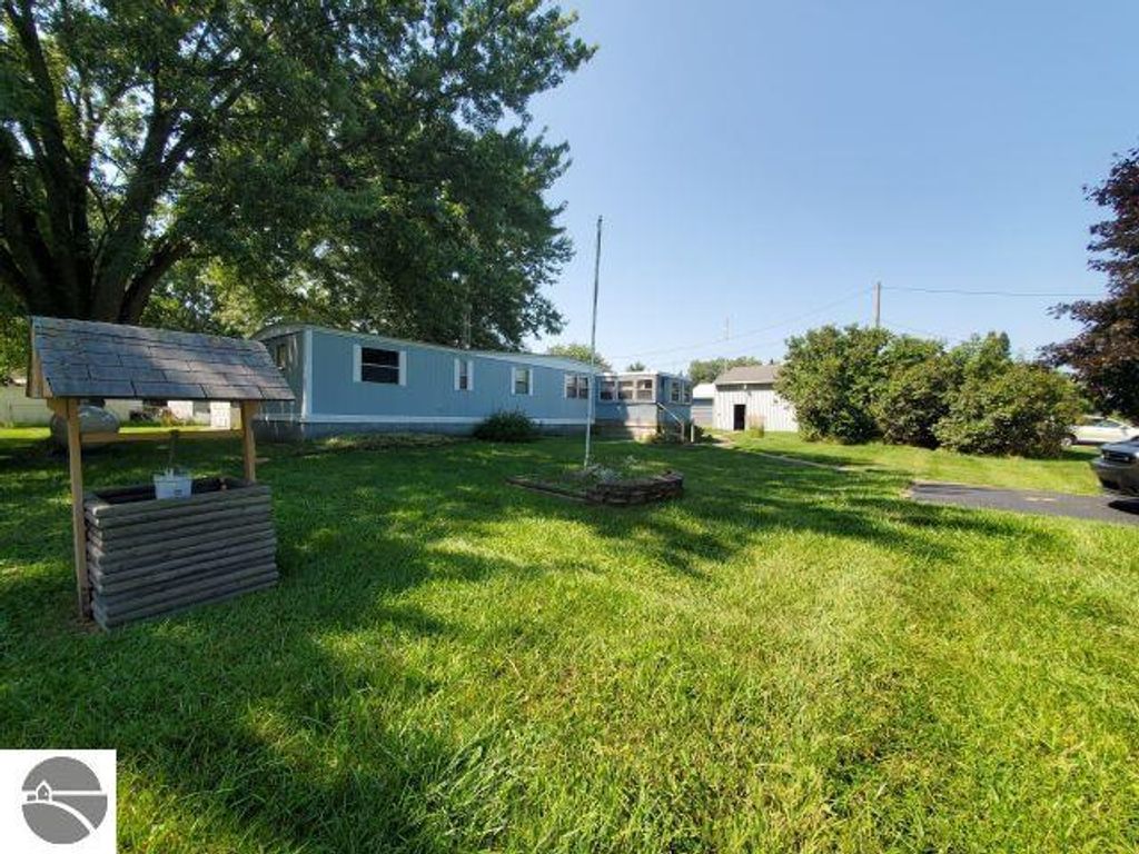 Photo of 2890 Twin Lake Road, Lupton, MI 48635 (MLS # 1937596)