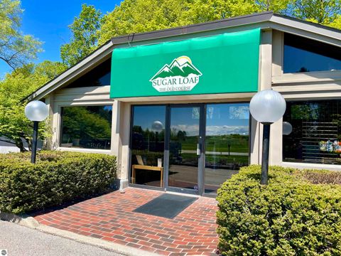 Tiny photo for 18 S Club Drive #18, Cedar, MI 49621 (MLS # 1940081)